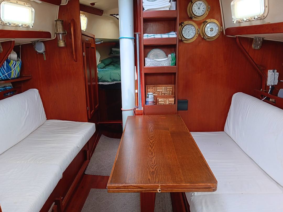 Main cabin with the salon table open for dining