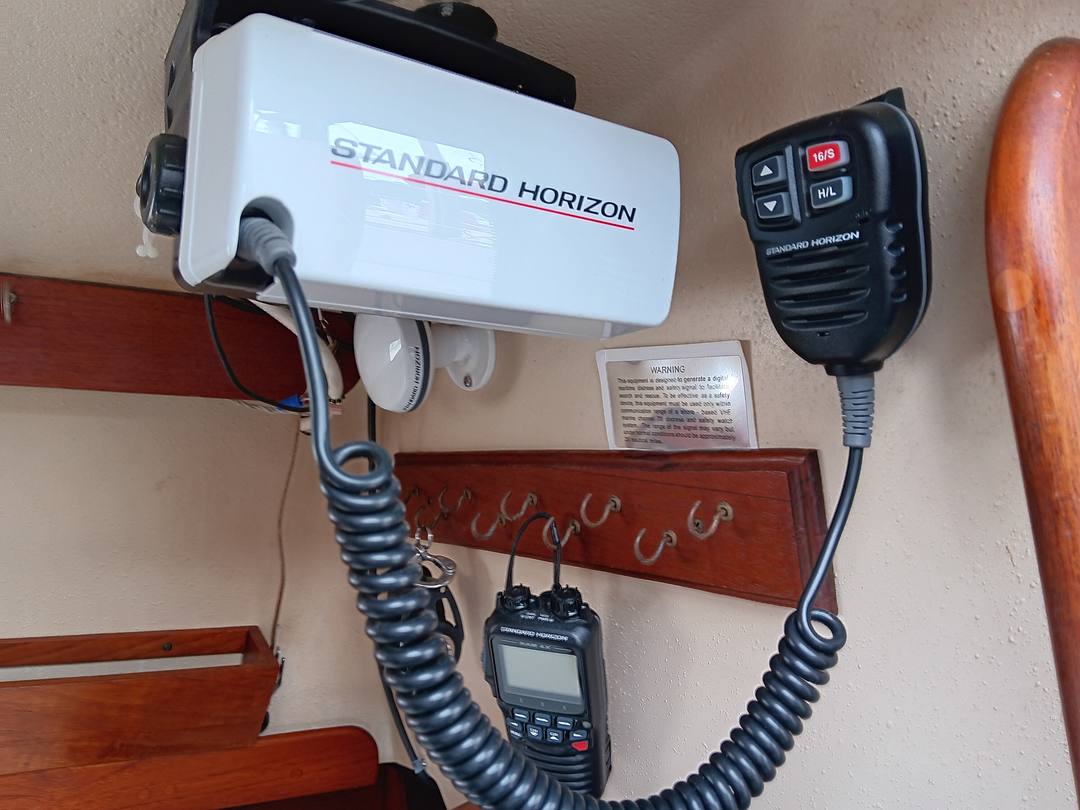 Standard Horizon VHF with remote mic and handheld at the companionway